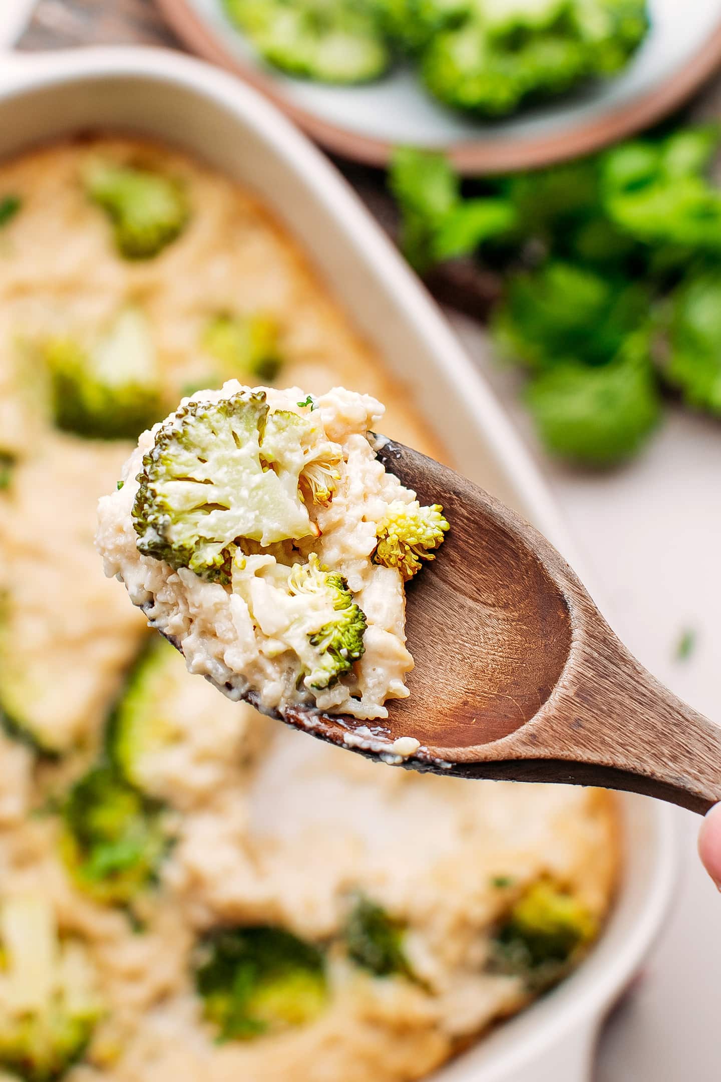 Spoonful of rice and broccoli.