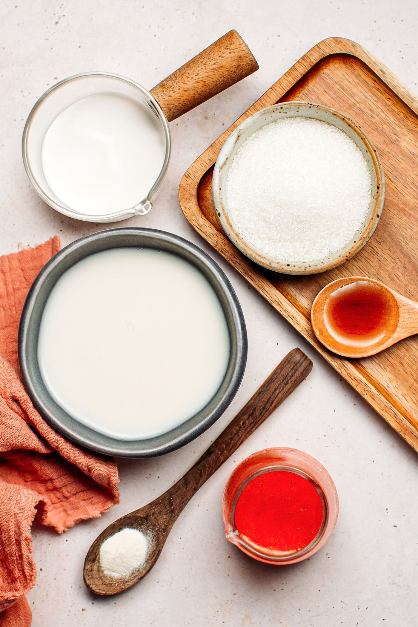Ingredients like almond milk, coconut milk, sugar, and vanilla extract.