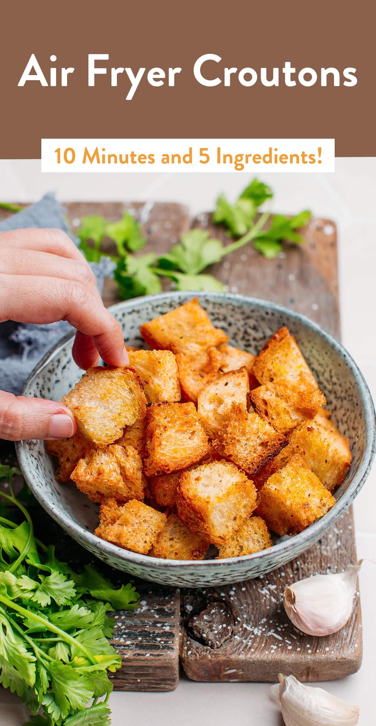 Super light and perfectly crispy, these air fryer garlic croutons are ready in just 10 minutes with 5 ingredients! What's not to love? Use them as a topping for warming soups, incorporate them in green salads, or enjoy them as a savory snack! #airfryer #croutons
