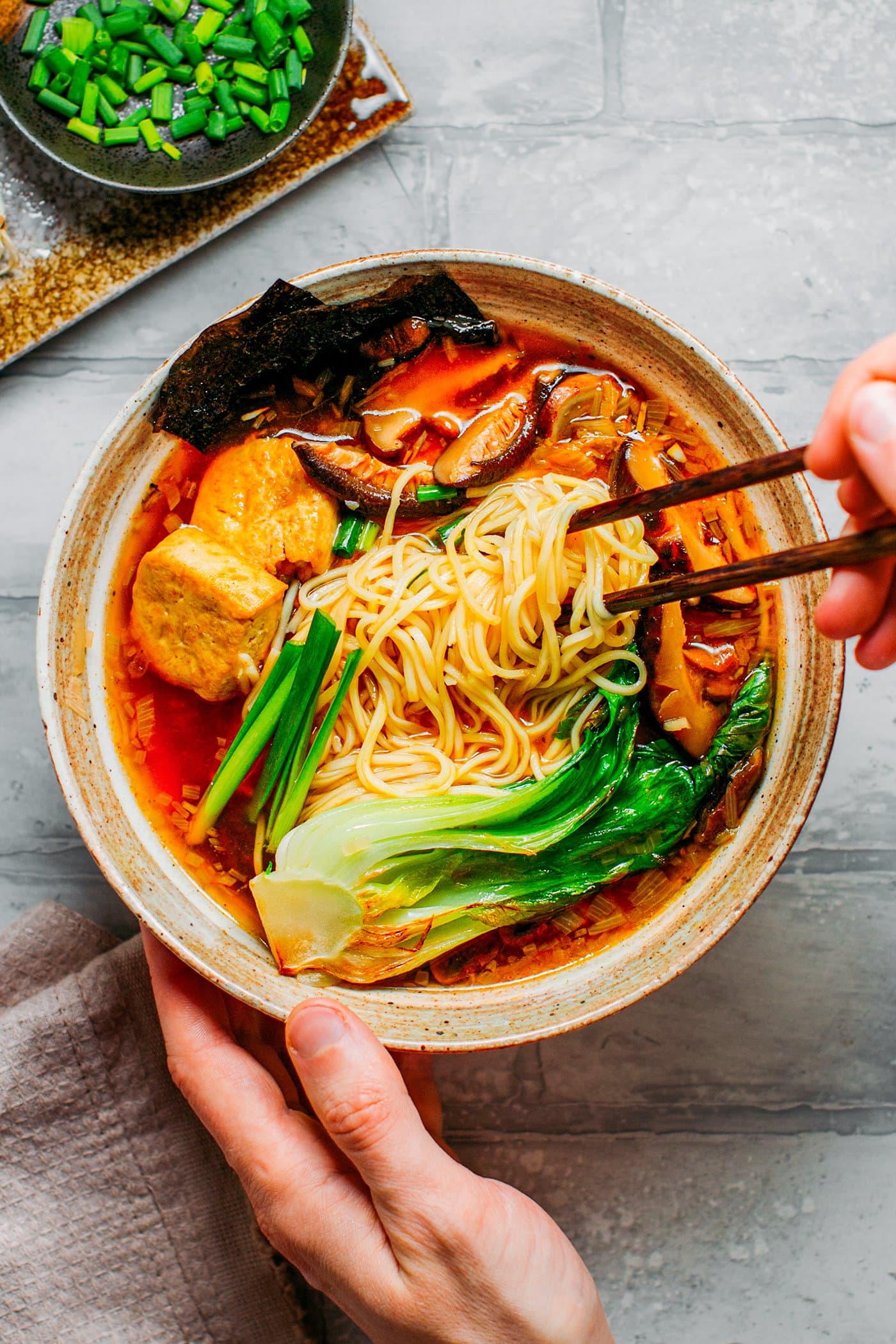 Vegan ramen bowl with chopsticks
