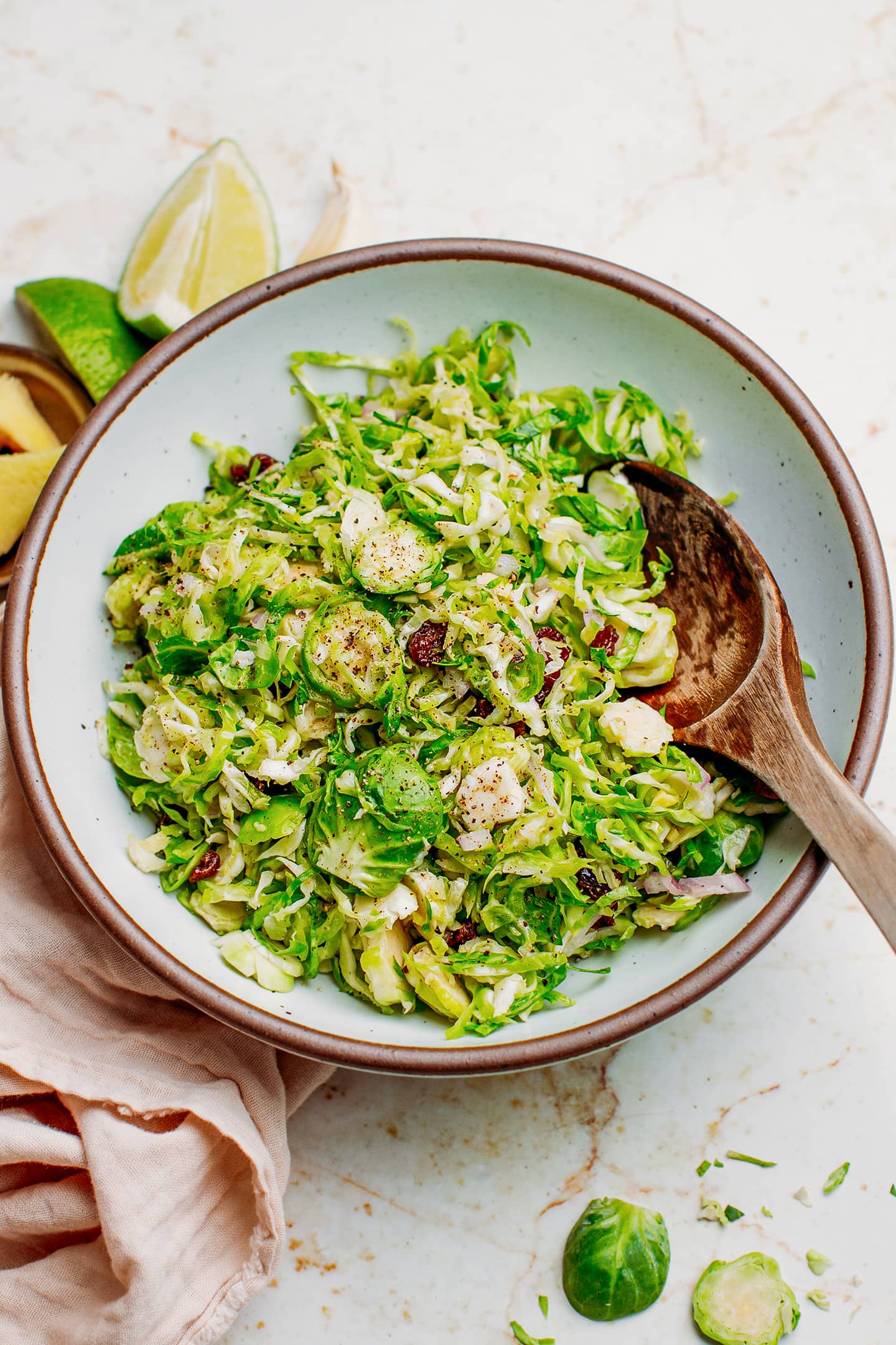 Shaved Brussels sprout salad with raisins and ginger.