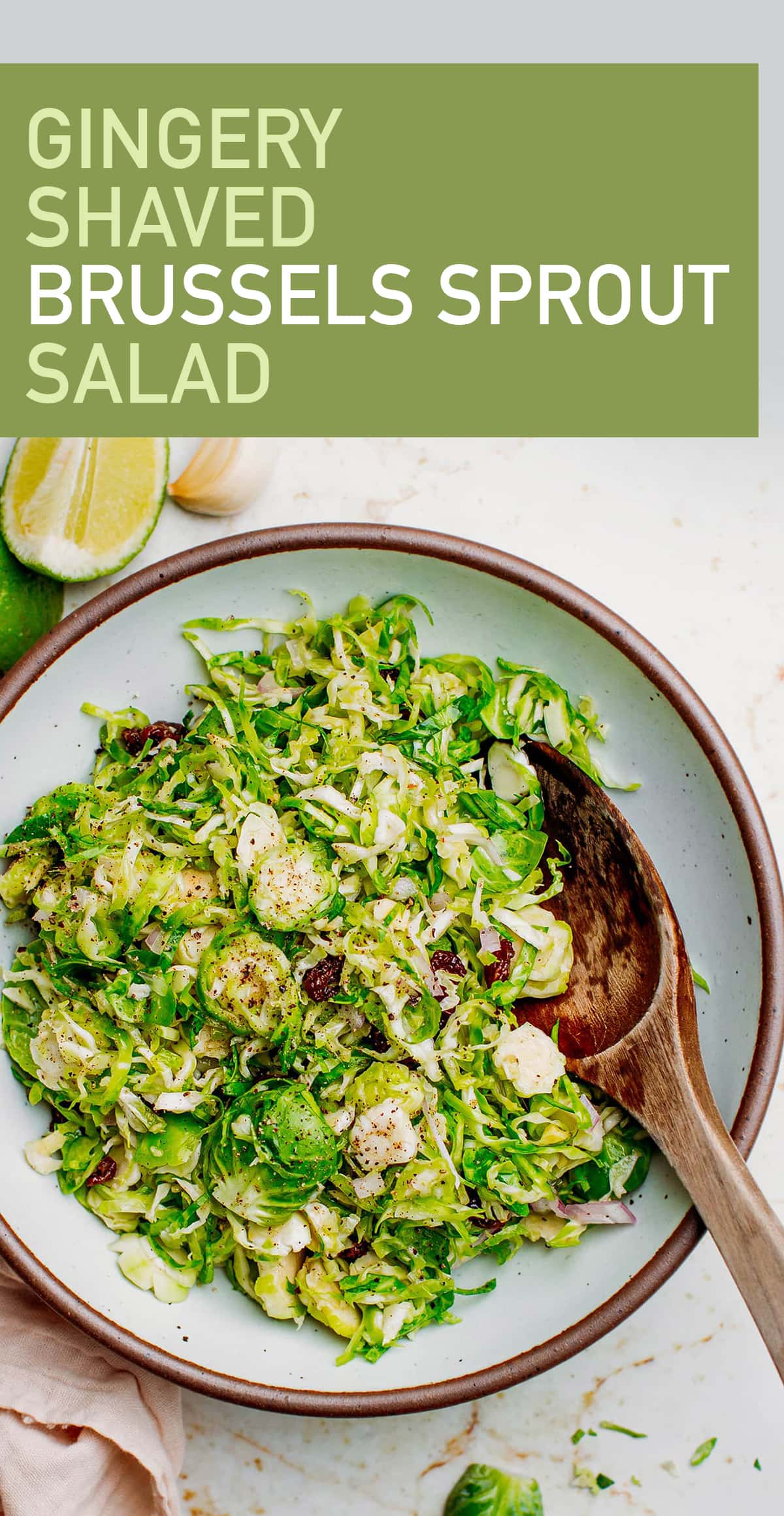 This shaved Brussels sprout salad has a satisfyingly crunchy texture and a zesty dressing infused with fresh ginger, garlic, lime, and shallots. It's a quick and simple side that pairs wonderfully with any festive dish! #brusselssprouts #salad #vegan