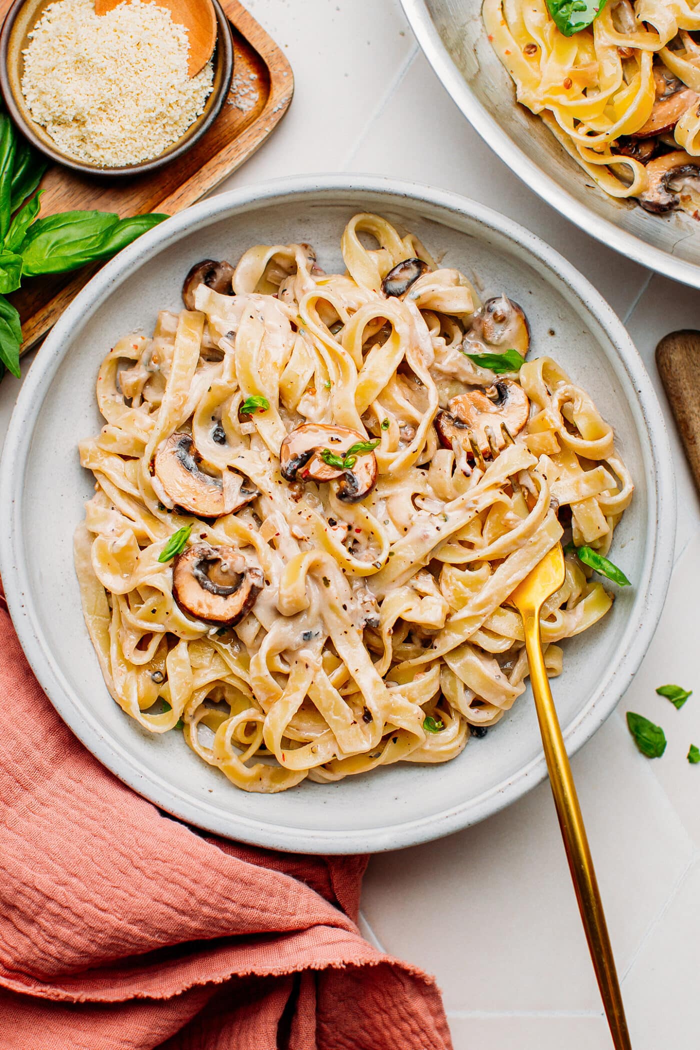 Mushroom pasta with peppercorn sauce on a plate.