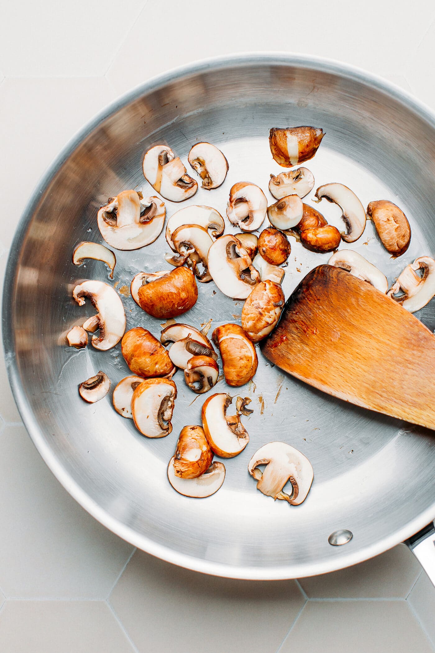 Sautéed mushrooms in a pan.