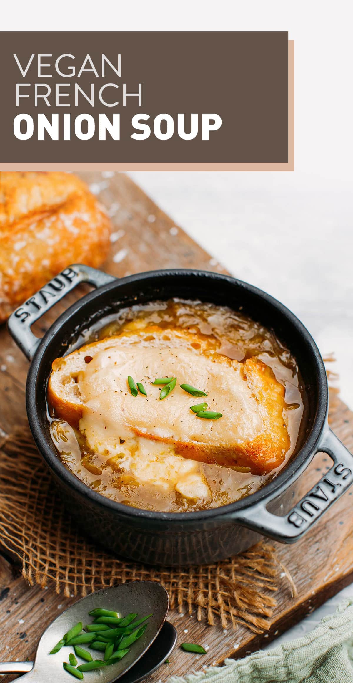 Warm up with this fantastic vegan French onion soup! It is loaded with caramelized onions, topped with crispy bread, and comes with a creamy vegan cheese sauce! A rustic dish that is so comforting on cold days!