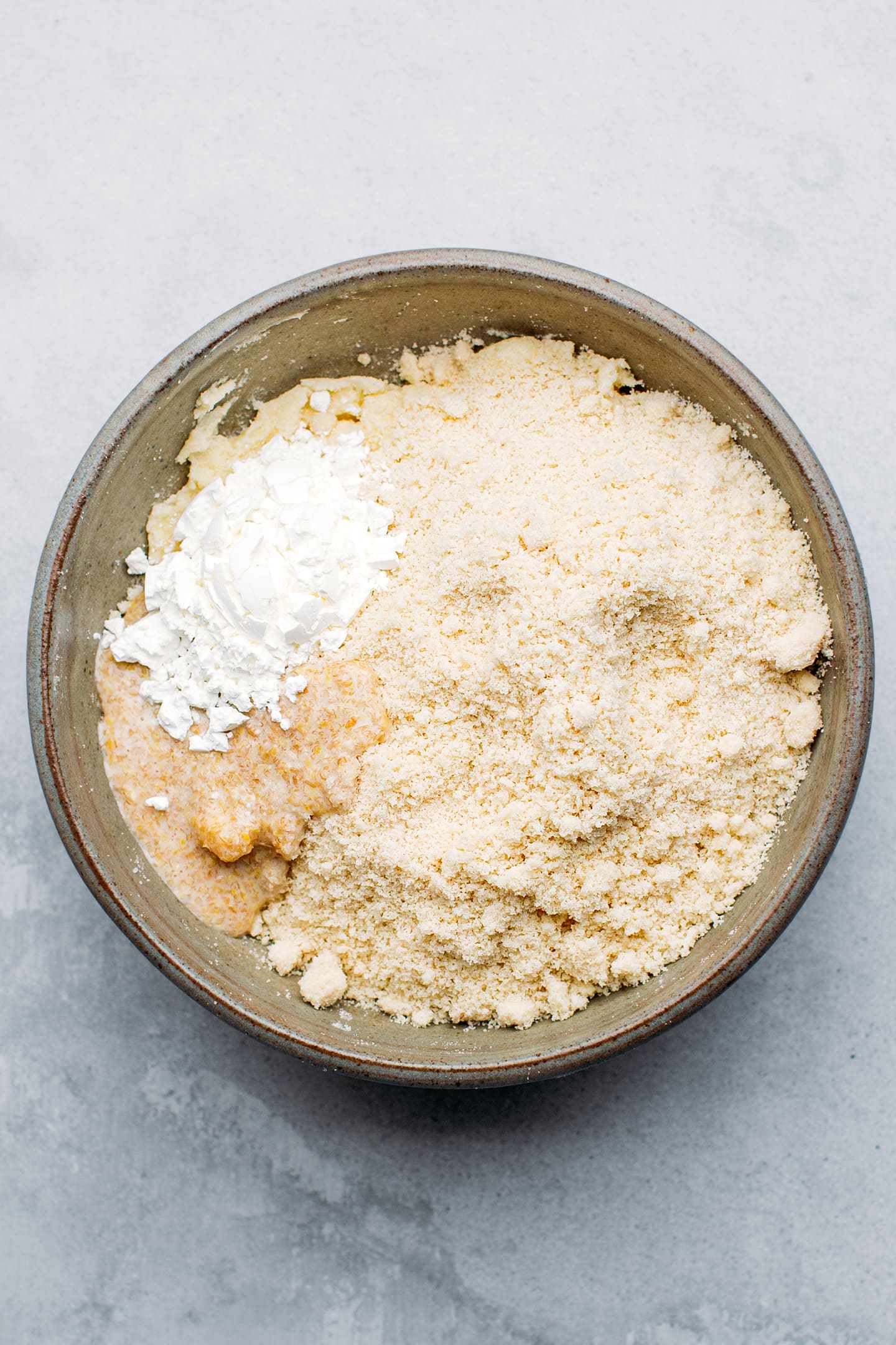 Almond flour, cornstarch, and flax egg in a mixing bowl.
