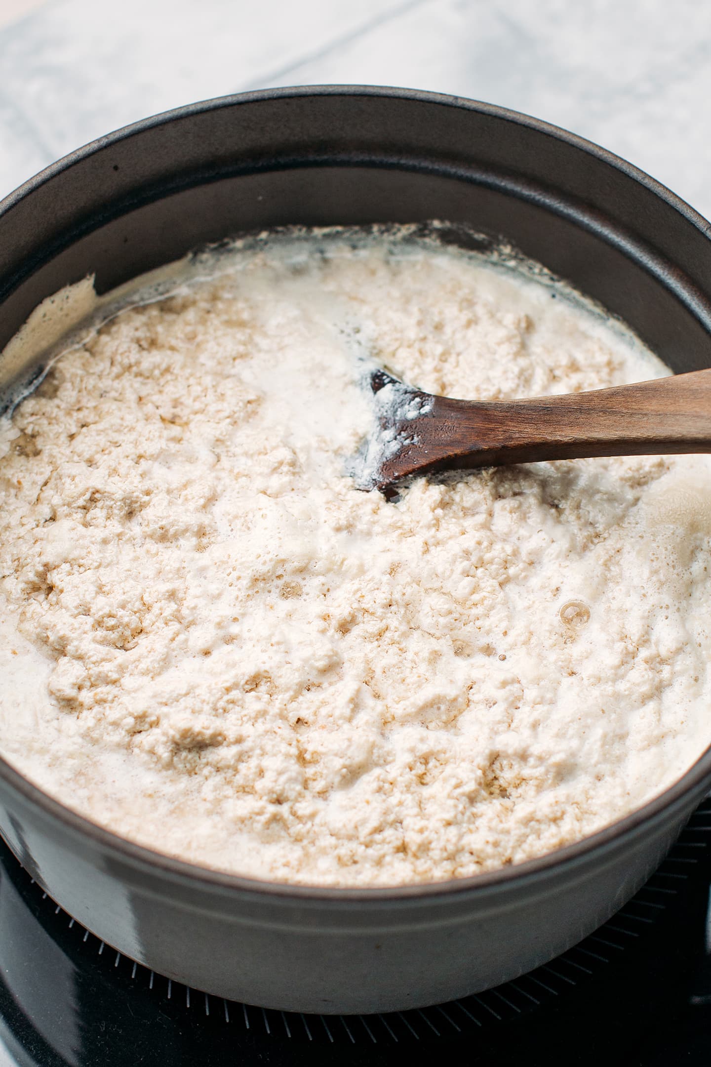 Curdled soy milk in a pot.