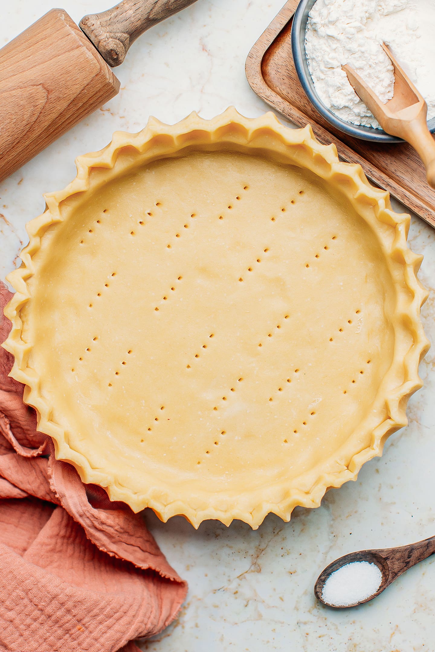 Homemade vegan pie crust in a pan.
