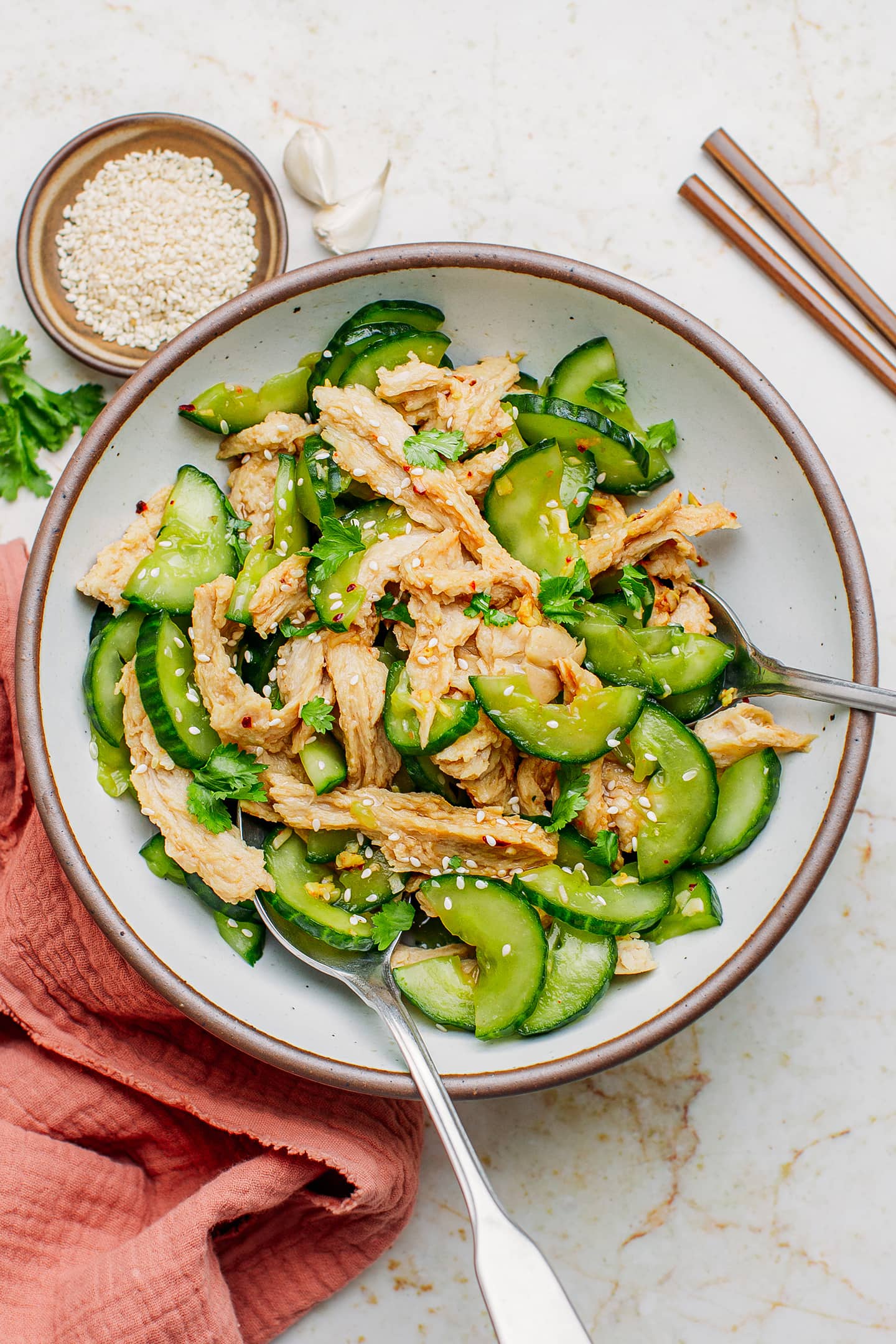 Vegan chicken salad with cucumber and sesame seeds.